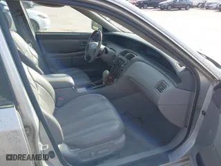 2003 Toyota Avalon XL with VIN 4T1BF28B53U302854, listed as a IAAI auction lot 42057098 with 230,127 mi miles. Bid and sale history available at carsss.com. Image 5.