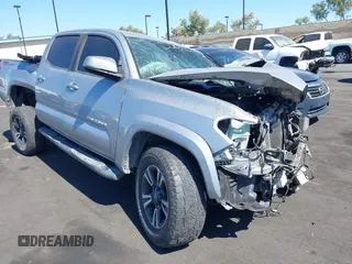 2019 Toyota Tacoma SR5 with VIN 3TMAZ5CN1KM099779, listed as a IAAI auction lot 42687831 with 99,997 mi miles and . Bid and sale history available at DreamBid. Image 1.