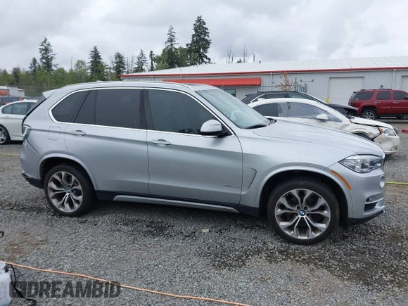 2017 BMW X5 xDrive35i z VIN 5UXKR0C34H0V83929, wystawiony jako IAAI lot #42204786 z przebiegiem 67 203 mil mil oraz . Historia ofert i sprzedaży dostępna na DreamBid. Obrazek 13.