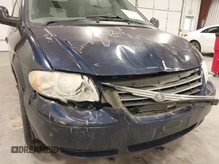 2006 Chrysler Town & Country LWB Touring with VIN 2A4GP54L16R860056, listed as a IAAI auction lot 41366007 with 140,388 mi miles. Bid and sale history available at carsss.com. Image 6.