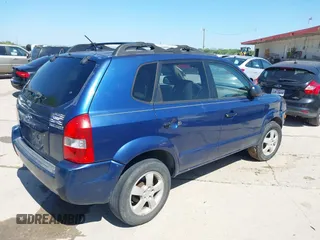 2006 Hyundai Tucson GL with VIN KM8JM12B06U386154, listed as a IAAI auction lot 41989899 with 168,069 mi miles. Bid and sale history available at carsss.com. Image 4.