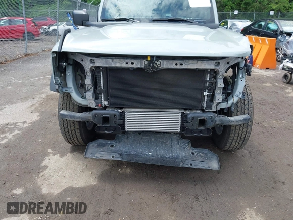 2023 Ford Bronco with VIN 1FMDE5BH5PLC15428, listed as a IAAI auction lot 42263776 with 11,556 mi miles and . Bid and sale history available at DreamBid. Image 6.