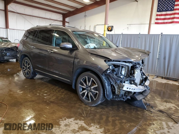 2020 Honda Pilot Touring 8-Passenger with VIN 5FNYF6H91LB033036, listed as a Copart auction lot 48685195 with 97,102 mi miles and Salvage Title. Bid and sale history available at DreamBid. Image 4.