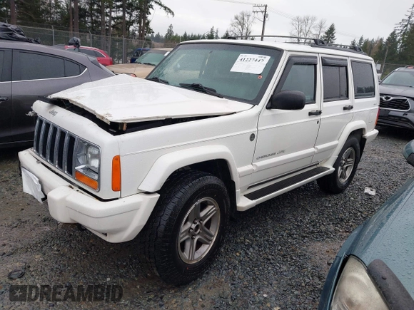 2000 Jeep Cherokee Classic with VIN 1J4FF58S4YL136213, listed as a IAAI auction lot 41227447 with 327,570 mi miles. Bid and sale history available at carsss.com. Image 17.