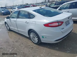 2015 Ford Fusion Energi SE Luxury with VIN 3FA6P0PU6FR128725, listed as a IAAI auction lot 41942887 with 138,731 mi miles. Bid and sale history available at carsss.com. Image 3.