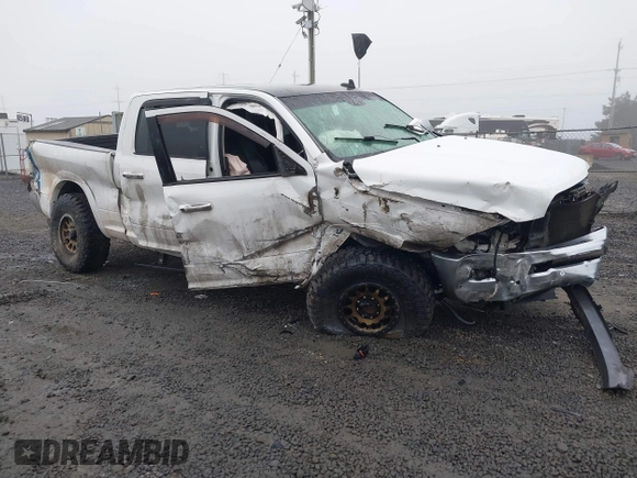 2016 Ram 2500 Laramie with VIN 3C6UR5NL2GG287071, listed as a IAAI auction lot 40989387 with 104,781 mi miles and . Bid and sale history available at DreamBid. Image 1.
