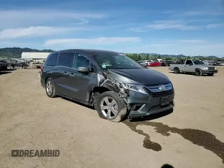2018 Honda Odyssey EX-L with VIN 5FNRL6H76JB010103, listed as a Copart auction lot 52965965 with 129,837 mi miles and Salvage Title. Bid and sale history available at carsss.com. Image 12.