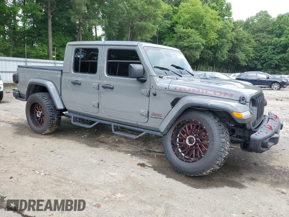2021 Jeep Gladiator Rubicon с VIN 1C6JJTBG5ML507579, выставлен на аукционе Copart как лот 60409785 с пробегом 62 585 миль миль и Списание • Salvage title. История ставок и продаж доступна на DreamBid. Изображение 4.
