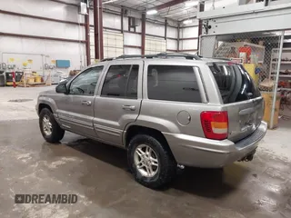 1999 Jeep Grand Cherokee Limited with VIN 1J4GW68N7XC752314, listed as a IAAI auction lot 41776905 with 228,023 mi miles. Bid and sale history available at carsss.com. Image 3.
