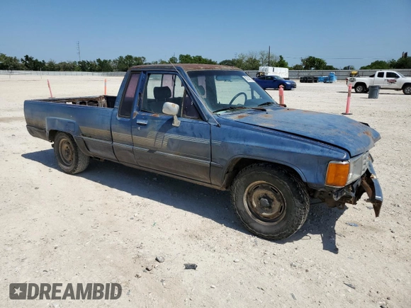 1986 Toyota Pickup с VIN JT4RN70D2G0018661, выставлен на аукционе Copart как лот 52309025 с пробегом 621 023 миль миль и Списание • Salvage title. История ставок и продаж доступна на DreamBid. Изображение 4.
