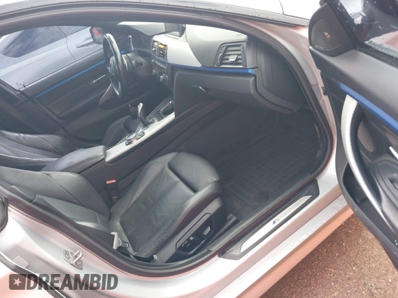 2015 BMW 4 Series 428i xDrive with VIN WBA4C9C50FD330482, listed as a IAAI auction lot 42116547 with 192,739 mi miles and . Bid and sale history available at DreamBid. Image 5.