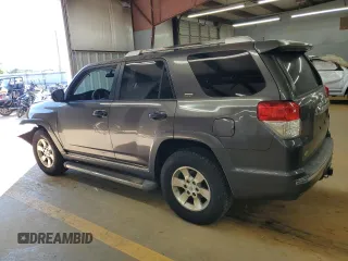 2011 Toyota 4Runner Trail z VIN JTEBU5JR6B5039779, wystawiony jako Copart lot #57750965 z przebiegiem 199 116 mil mil oraz Szkoda całkowita • Salvage title. Historia ofert i sprzedaży dostępna na DreamBid. Obrazek 2.
