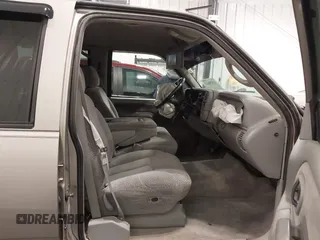 1999 GMC Yukon with VIN 1GKEK13R7XJ723255, listed as a IAAI auction lot 41879617 with 148,324 mi miles. Bid and sale history available at carsss.com. Image 5.