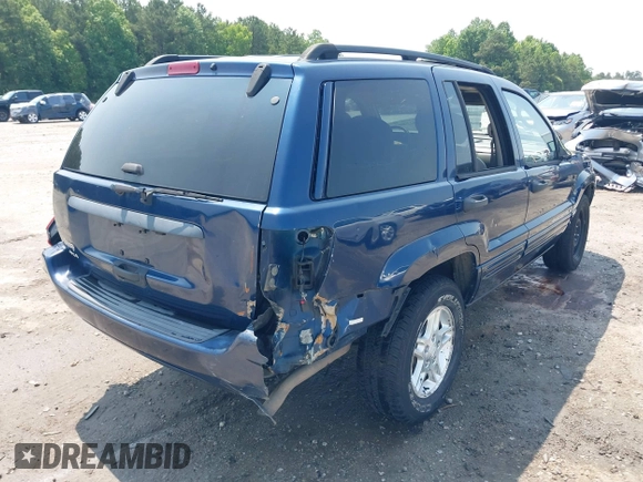 2002 Jeep Grand Cherokee Laredo with VIN 1J8GW48SX2C270339, listed as a IAAI auction lot 42390842 with Not provided miles and . Bid and sale history available at DreamBid. Image 4.