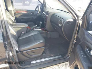 2006 GMC Envoy SLE with VIN 1GKDT13S262204960, listed as a IAAI auction lot 42045236 with 183,338 mi miles. Bid and sale history available at carsss.com. Image 5.
