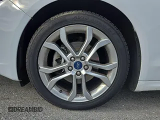 2020 Ford Fusion SEL with VIN 3FA6P0CD1LR154201, listed as a IAAI auction lot 42715761 with 99,448 mi miles and . Bid and sale history available at DreamBid. Image 33.