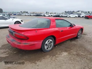 1995 Pontiac Firebird Firebird z VIN 2G2FS22K8S2253829, wystawiony jako IAAI lot #42471573 z przebiegiem 193 095 mil mil oraz . Historia ofert i sprzedaży dostępna na DreamBid. Obrazek 4.