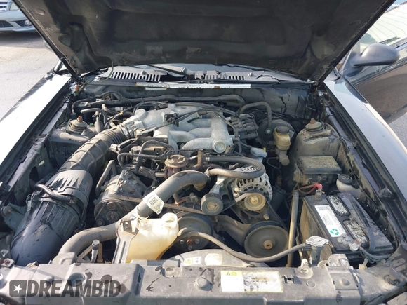 2004 Ford Mustang Deluxe with VIN 1FAFP446X4F187154, listed as a IAAI auction lot 42068363 with 125,074 mi miles. Bid and sale history available at carsss.com. Image 10.