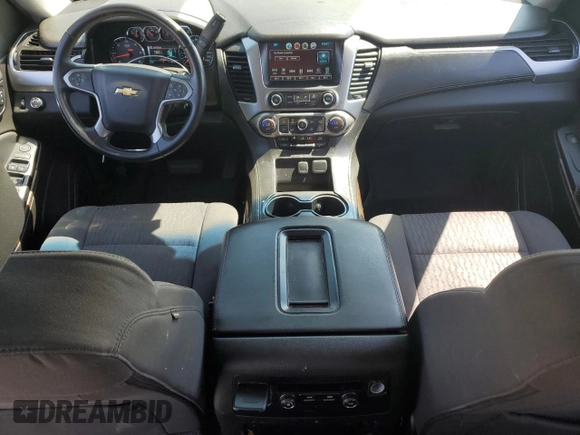 2016 Chevrolet Tahoe LS with VIN 1GNSCAKC7GR465949, listed as a Copart auction lot 50030625 with 136,608 mi miles and Salvage title. Bid and sale history available at DreamBid. Image 8.