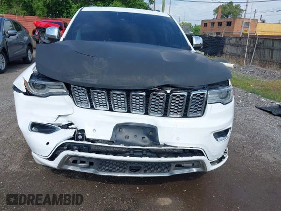 2017 Jeep Grand Cherokee Overland with VIN 1C4RJFCT6HC880306, listed as a IAAI auction lot 42534987 with 97,976 mi miles and . Bid and sale history available at DreamBid. Image 6.