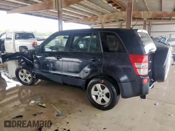 2011 Suzuki Grand Vitara Premium with VIN JS3TD0D28B4102365, listed as a Copart auction lot 60560495 with 176,190 mi miles and Salvage title. Bid and sale history available at DreamBid. Image 2.