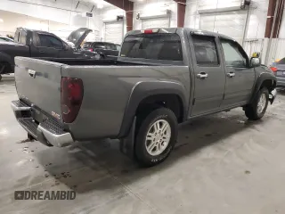 2010 GMC Canyon SLE1 with VIN 1GTJTCDE5A8148716, listed as a Copart auction lot 57559215 with 126,523 mi miles and Salvage title. Bid and sale history available at DreamBid. Image 3.