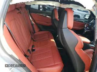 2023 BMW X4 M with VIN 5YM23EC08P9S82734, listed as a Copart auction lot 53445774 with 0 mi miles and Salvage Title. Bid and sale history available at carsss.com. Image 10.