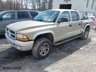 2002 Dodge Dakota SLT with VIN 1B7HG48N82S616607, listed as a IAAI auction lot 41837480 with 328,430 mi miles. Bid and sale history available at carsss.com. Image 2.