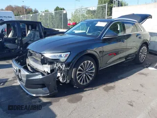 2019 Audi e-tron Prestige with VIN WA1VAAGE2KB021539, listed as a IAAI auction lot 42007353 with 14,238 mi miles and . Bid and sale history available at DreamBid. Image 2.