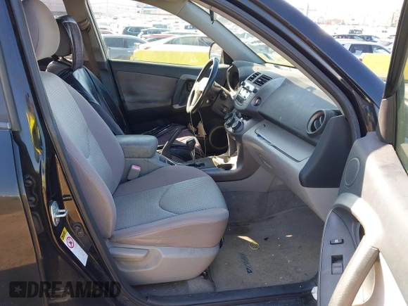 2007 Toyota RAV4 with VIN JTMBD33V676026194, listed as a IAAI auction lot 42001542 with 188,991 mi miles. Bid and sale history available at carsss.com. Image 5.