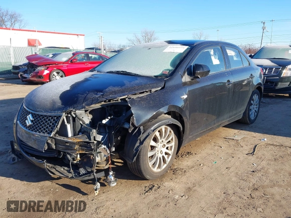 2010 Suzuki Kizashi SE with VIN JS2RE9A34A6100807, listed as a IAAI auction lot 41690974 with 122,419 mi miles and . Bid and sale history available at DreamBid. Image 2.