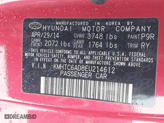 2014 Hyundai Veloster with VIN KMHTC6AD8EU214612, listed as a IAAI auction lot 41258820 with 61,984 mi miles. Bid and sale history available at carsss.com. Image 9.