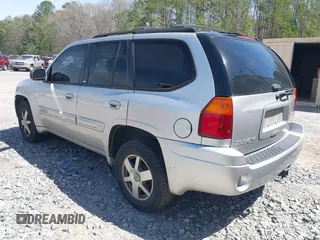 2005 GMC Envoy SLE with VIN 1GKDS13S652390259, listed as a IAAI auction lot 41825258 with 162,172 mi miles and . Bid and sale history available at DreamBid. Image 3.