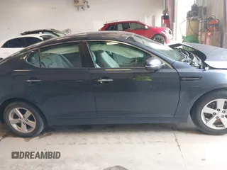 2015 Kia Optima LX z VIN 5XXGM4A77FG483662, wystawiony jako IAAI lot #42602173 z przebiegiem 81 971 mil mil oraz . Historia ofert i sprzedaży dostępna na DreamBid. Obrazek 13.
