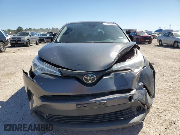 2019 Toyota C-HR XLE with VIN JTNKHMBX8K1051600, listed as a Copart auction lot 47449615 with 82,309 mi miles and Salvage Title. Bid and sale history available at DreamBid. Image 5.