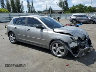2005 Mazda 3 s with VIN JM1BK343051338251, listed as a Copart auction lot 54321465 with 106,183 mi miles and Salvage Title. Bid and sale history available at DreamBid. Image 4.