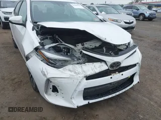 2017 Toyota Corolla L z VIN 2T1BURHE8HC787010, wystawiony jako IAAI lot #42366723 z przebiegiem 104 805 mil mil oraz . Historia ofert i sprzedaży dostępna na DreamBid. Obrazek 6.