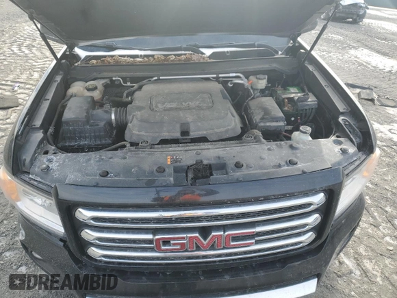 2015 GMC Canyon 4WD SLE with VIN 1GTG6BE34F1165547, listed as a Copart auction lot 43930715 with 124,970 mi miles and Salvage Title. Bid and sale history available at carsss.com. Image 12.