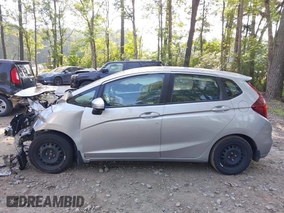 2020 Honda Fit LX z VIN 3HGGK5H47LM717334, wystawiony jako IAAI lot #42574053 z przebiegiem 81 279 mil mil oraz . Historia ofert i sprzedaży dostępna na DreamBid. Obrazek 14.