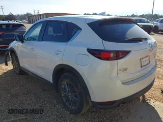 2019 Mazda CX-5 Sport with VIN JM3KFBBM0K0574255, listed as a IAAI auction lot 41661924 with 93,851 mi miles and . Bid and sale history available at DreamBid. Image 3.