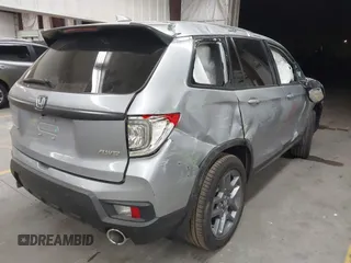 2023 Honda Passport EX-L with VIN 5FNYF8H56PB025612, listed as a IAAI auction lot 41937956 with 31,065 mi miles and . Bid and sale history available at DreamBid. Image 4.