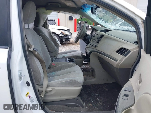 2011 Toyota Sienna LE AAS with VIN 5TDKK3DC6BS091557, listed as a IAAI auction lot 42170157 with 398,019 mi miles and . Bid and sale history available at DreamBid. Image 5.