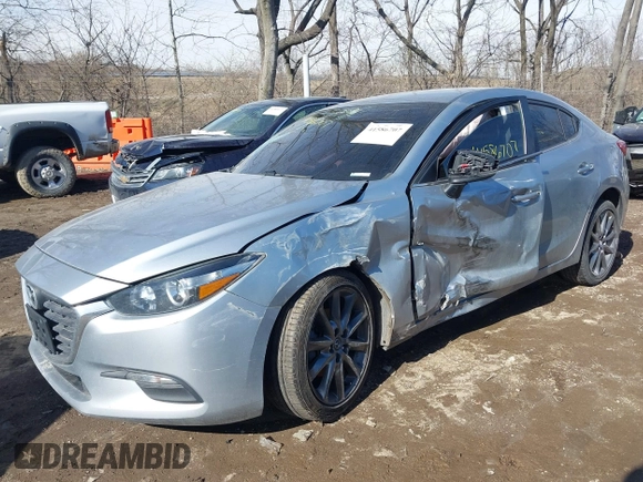 2018 Mazda 3 Touring z VIN 3MZBN1V36JM205904, wystawiony jako IAAI lot #41586707 z przebiegiem 145 401 mil mil oraz . Historia ofert i sprzedaży dostępna na DreamBid. Obrazek 6.