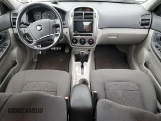 2005 Kia Spectra with VIN KNAFE161055128022, listed as a Copart auction lot 85615204 with 105,444 mi miles and Clean Title. Bid and sale history available at DreamBid. Image 8.