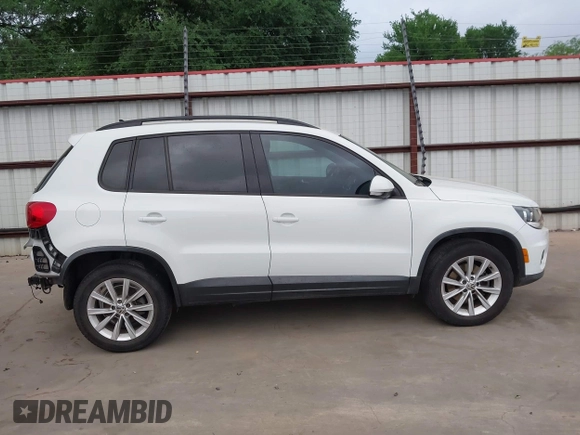 2015 Volkswagen Tiguan R-Line with VIN WVGAV7AX5FW585248, listed as a IAAI auction lot 41909618 with 137,448 mi miles and . Bid and sale history available at DreamBid. Image 14.