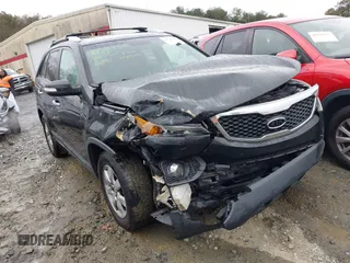 2013 Kia Sorento LX z VIN 5XYKT3A69DG354992, wystawiony jako IAAI lot #41538447 z przebiegiem 178 027 mil mil oraz . Historia ofert i sprzedaży dostępna na DreamBid. Obrazek 13.