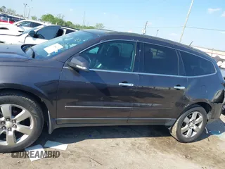 2016 Chevrolet Traverse LTZ z VIN 1GNKRJKD1GJ301277, wystawiony jako IAAI lot #41884629 z przebiegiem 106 338 mil mil oraz . Historia ofert i sprzedaży dostępna na DreamBid. Obrazek 14.