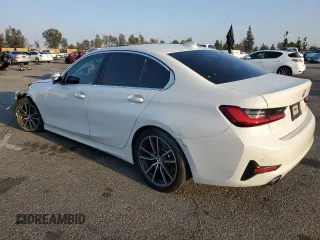 2020 BMW 3 Series 330i with VIN 3MW5R1J04L8B21380, listed as a Copart auction lot 42872005 with 89,553 mi miles and Salvage Title. Bid and sale history available at carsss.com. Image 2.
