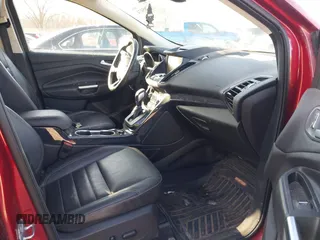 2015 Ford Escape Titanium z VIN 1FMCU9J9XFUC75357, wystawiony jako IAAI lot #41705474 z przebiegiem 198 381 mil mil oraz . Historia ofert i sprzedaży dostępna na DreamBid. Obrazek 5.