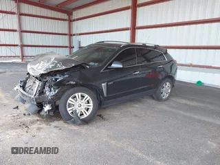 2016 Cadillac SRX Luxury Collection z VIN 3GYFNEE39GS555747, wystawiony jako IAAI lot #42347516 z przebiegiem 143 061 mil mil oraz . Historia ofert i sprzedaży dostępna na DreamBid. Obrazek 2.